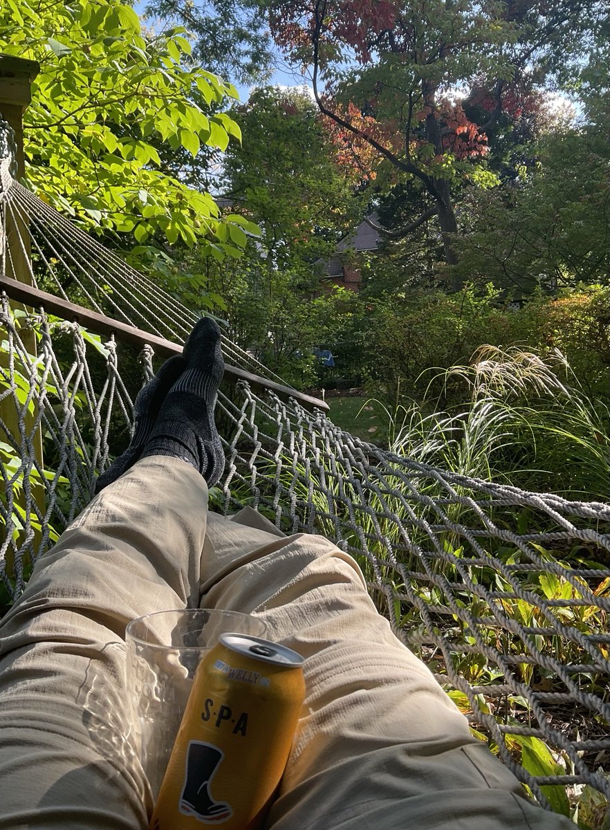 Physicist relaxing in a hammock with SPA drink