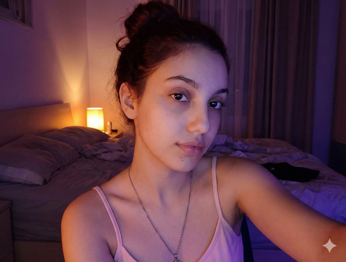 Intimate Low-Light Bedroom Selfie (Chiaroscuro)