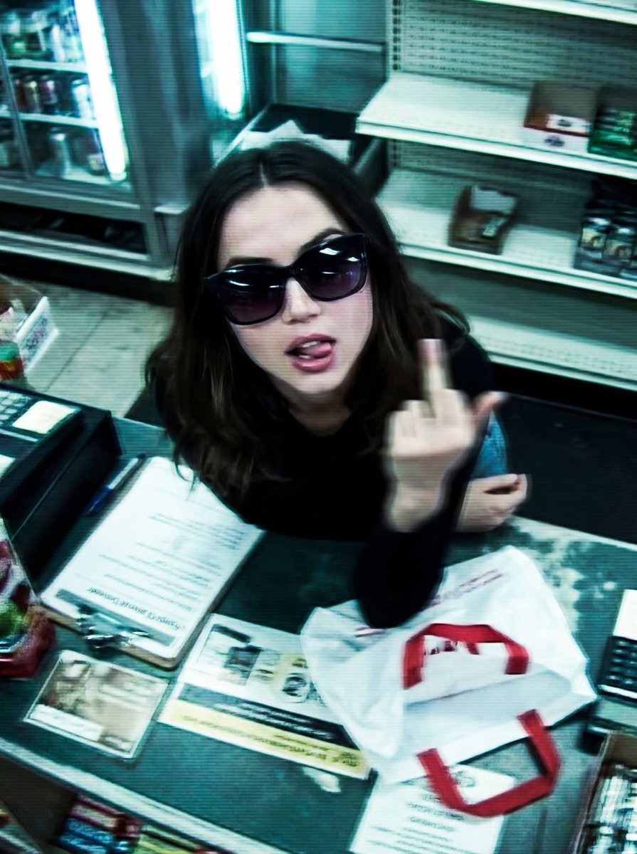 Low-fidelity CCTV image of a defiant subject