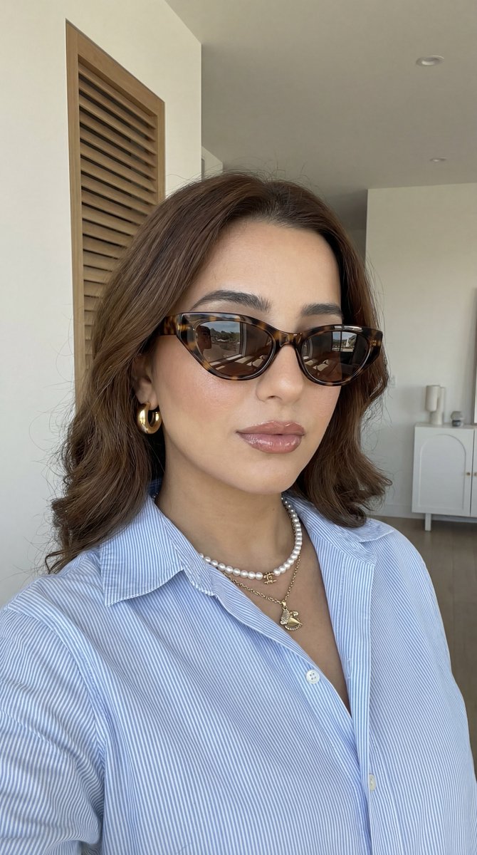 Photoreal fashion selfie with strict identity lock