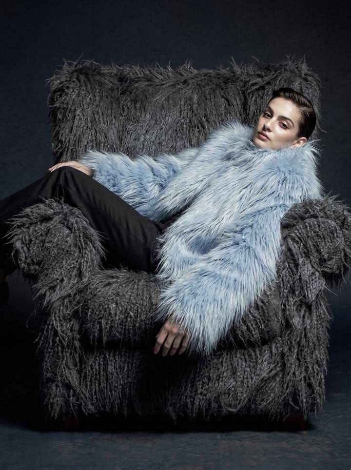 Ultra-high fashion editorial portrait in faux-fur coat