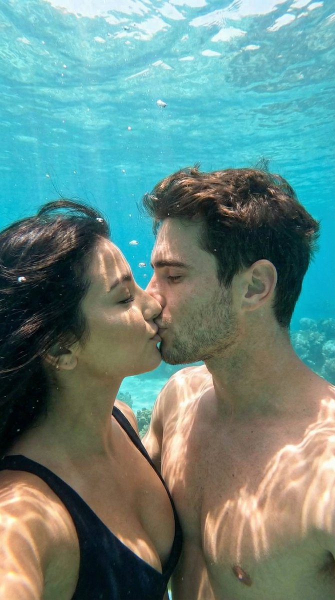 Underwater Cinematic Couple Kiss with Identity Preservation