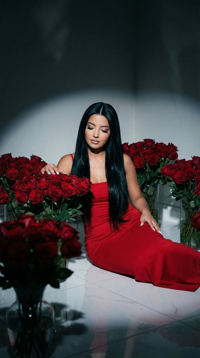 Cinematic Low-Key Portrait in Red Rose Room