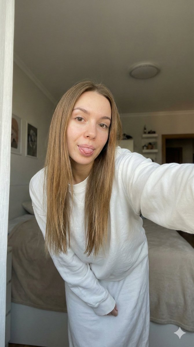 Candid Smartphone Selfie with Playful Expression