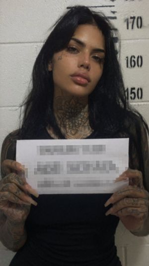 Gritty Tattooed Woman Mugshot – GPT Image 2 prompt by Riccardo Wolf