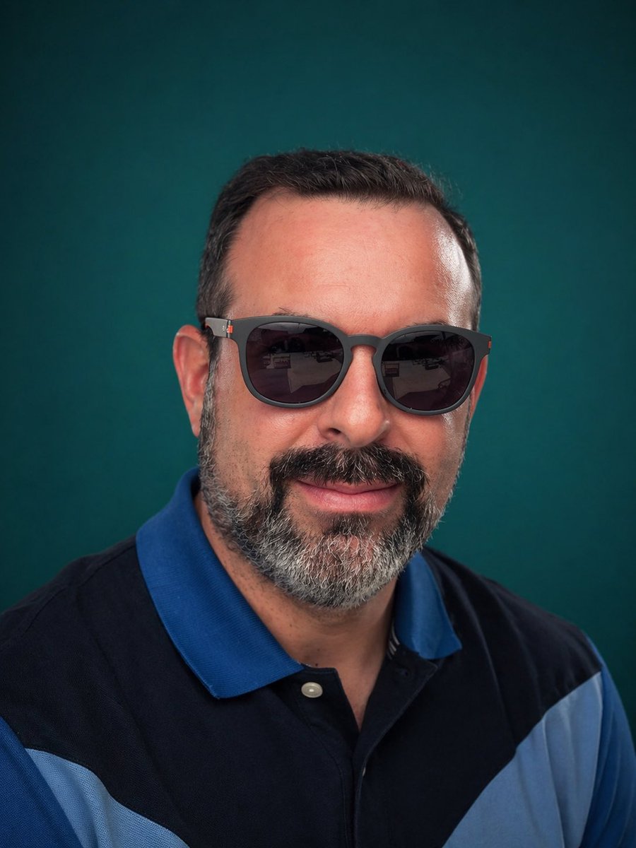 Selfie to Studio Headshot Qwen Image prompt example: This prompt turns a casual reference selfie into a polished professional studio headshot, useful for business profiles,...