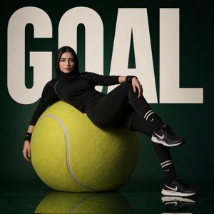 Athlete on Giant Tennis Ball