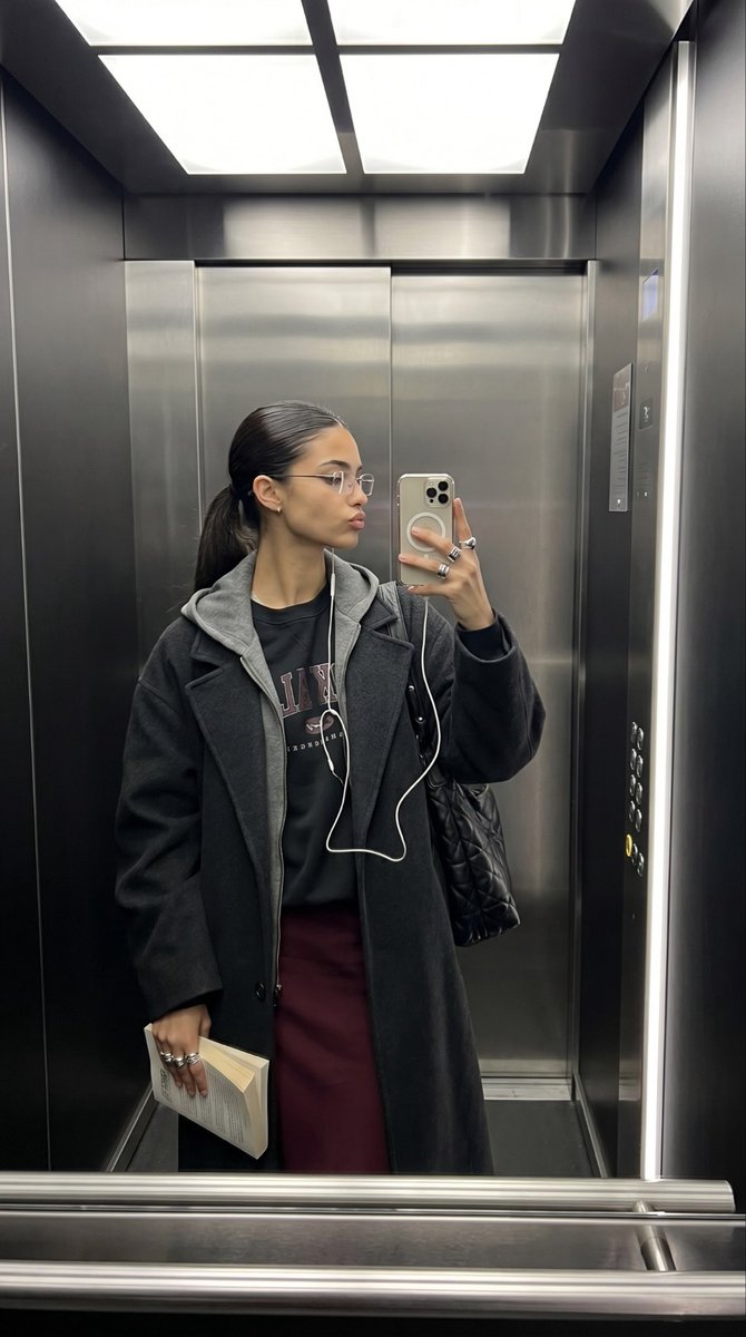 Sample output image for Elevator Mirror Selfie with Book