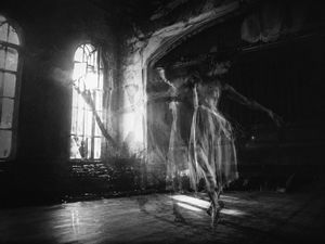Ghostly Ballerina in Abandoned Theater