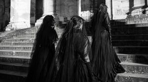 Gothic Mourning Women on Cathedral Steps
