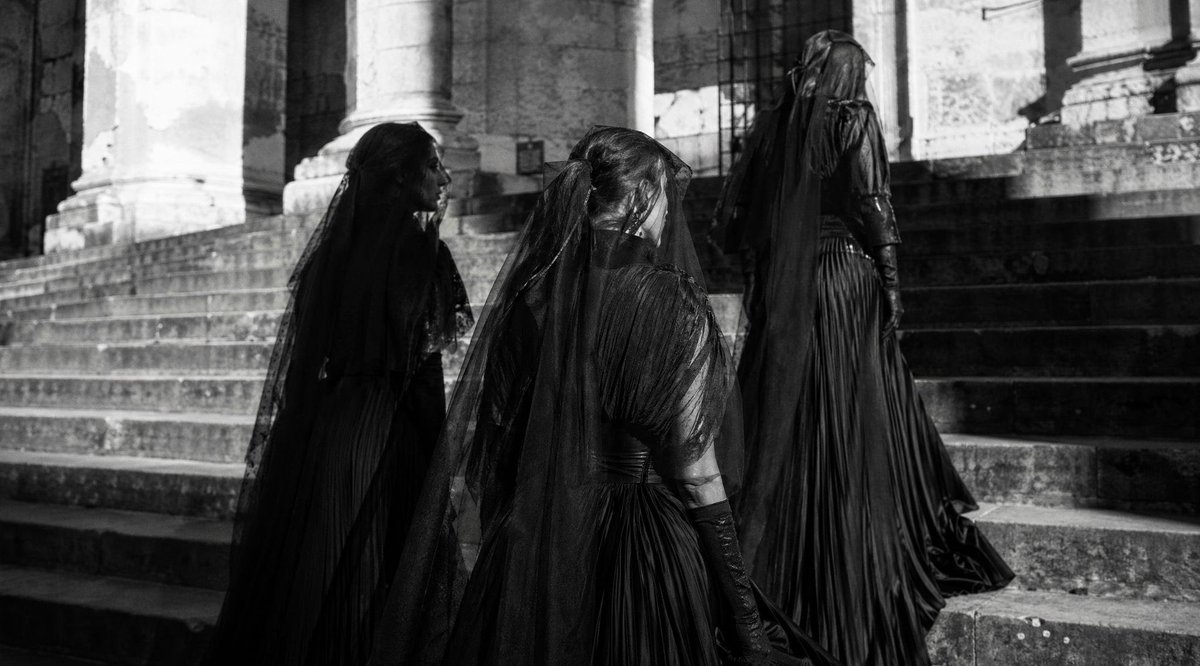 Gothic Mourning Women on Cathedral Steps
