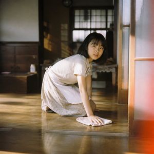 Nostalgic Japanese Home Cleaning Scene AI image template preview