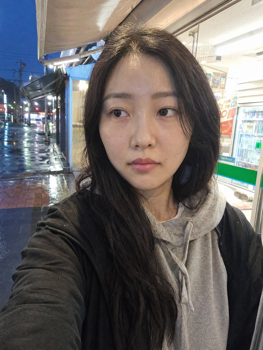 Rainy Convenience Store Selfie