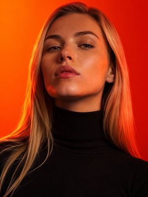 Editorial Fashion Portrait with Warm Lighting — Ultra-photorealistic editorial fashion portrait of a {argument name="subject" default="beautiful young woman wit