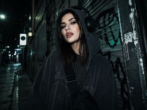 Night Urban Grunge Portrait — Using the attached photo as the reference, create a nighttime urban photographic portrait of a young…