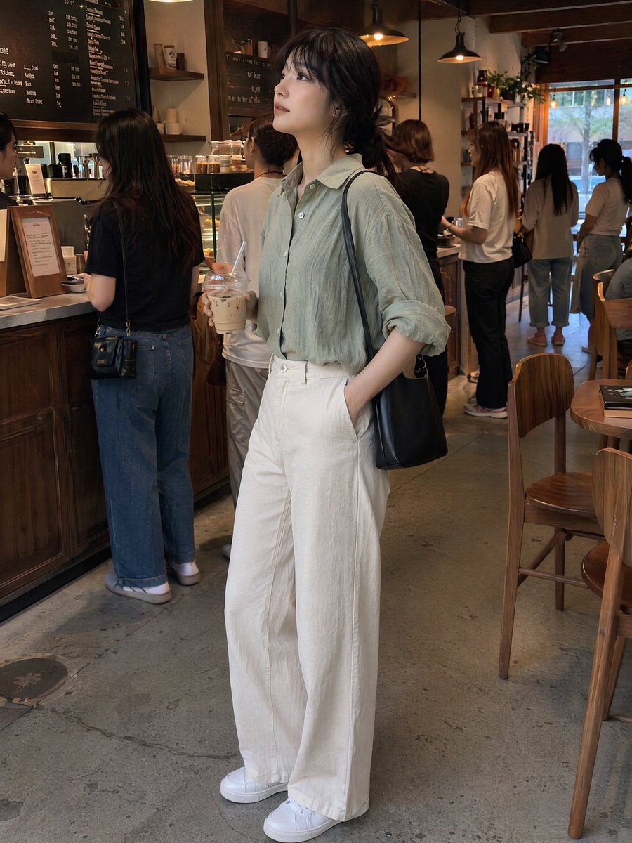 Candid Café Woman with Iced Latte