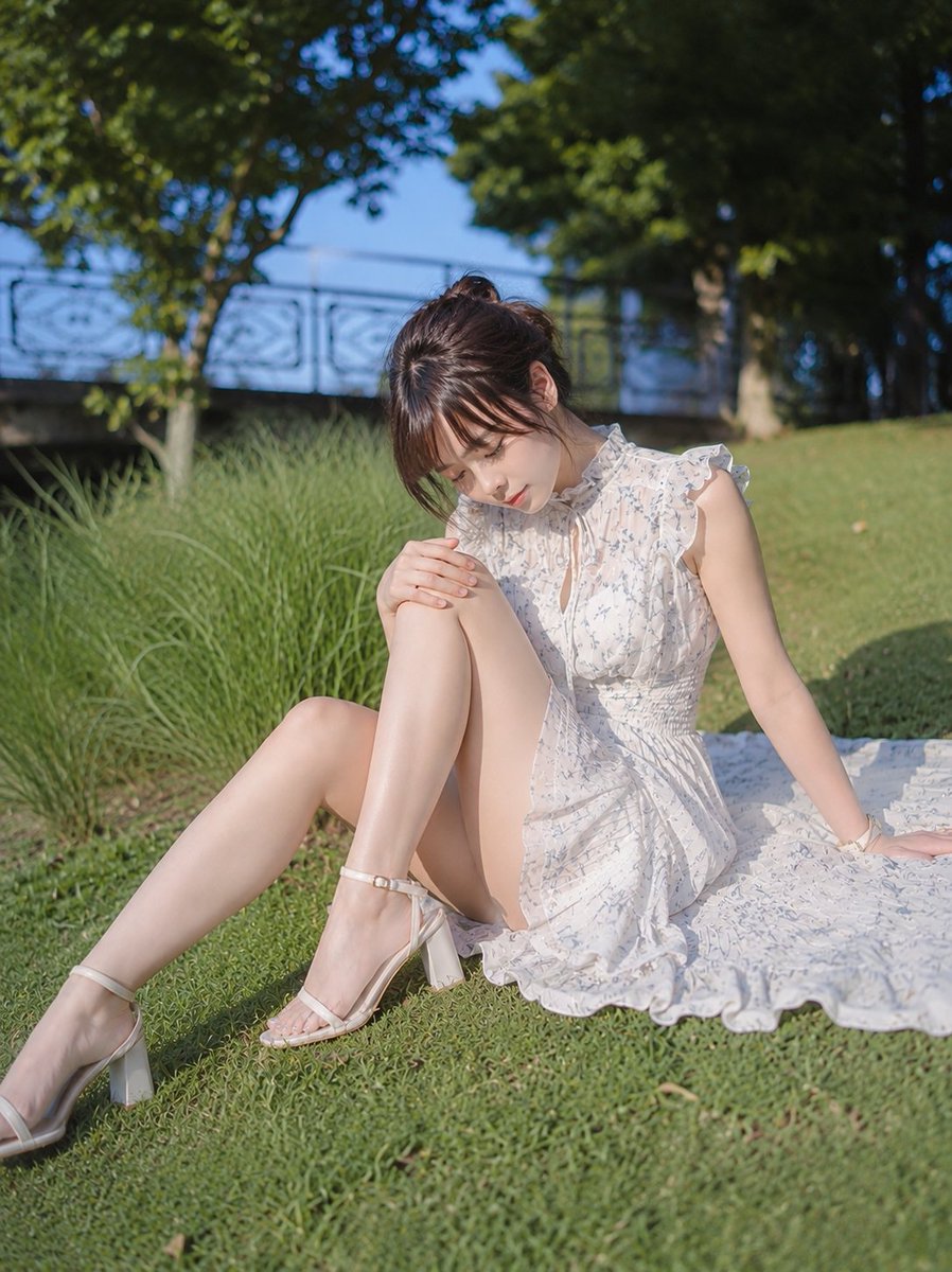 Elegant Japanese Woman in Summer Park Portrait