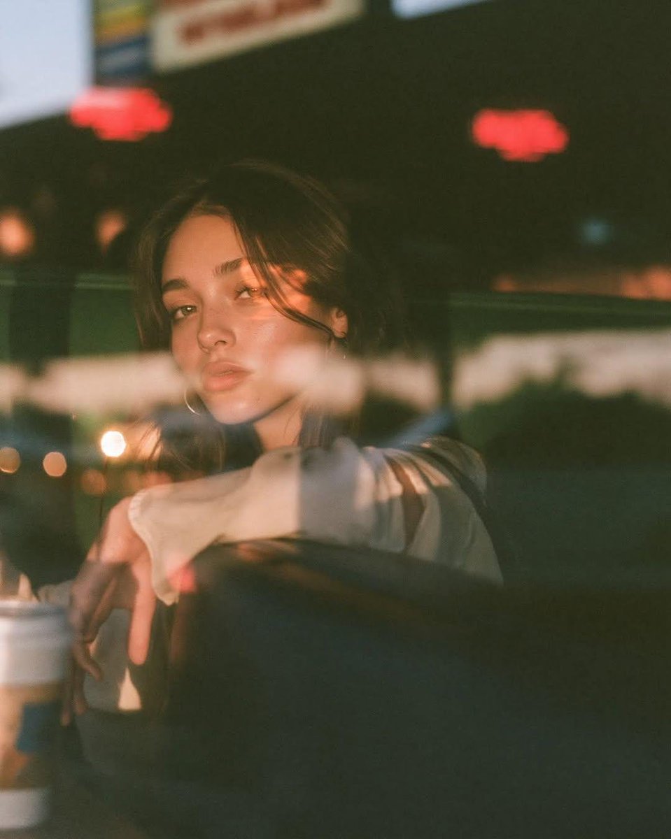 Cinematic Café Portrait at Blue Hour