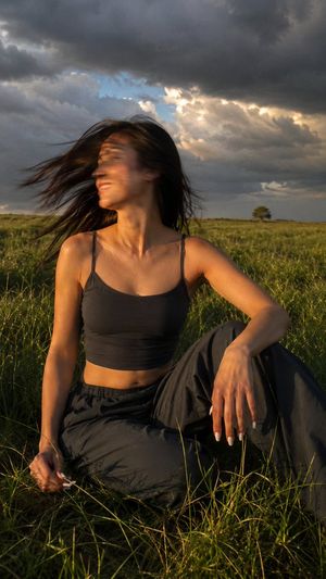 Spontaneous Motion Meadow Photography — Ultra-realistic cinematic film photograph of a {argument name="subject" default="beautiful young wom…