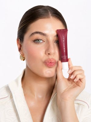 Realistic Cosmetic Beauty Campaign — Use the uploaded model photo as an exact personality reference. Preserve appearance 1:1: face, features, proportions, skin,