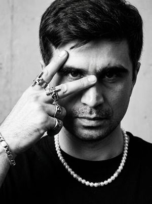 Noir Punk Street Portrait — A RAW black-and-white street portrait generated from the input photo.
VIBE: {argument name="vibe" default="Harsh noir, artistic rebe