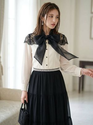 Elegant Black Organza Ribbon — Elegant {argument name="color" default="Black"} {argument name="material" default="Organza"} Ribbon